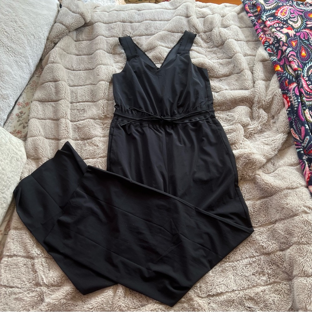Athleta Black Sleeveless Jumpsuit with V-Neckline and Belted Waist